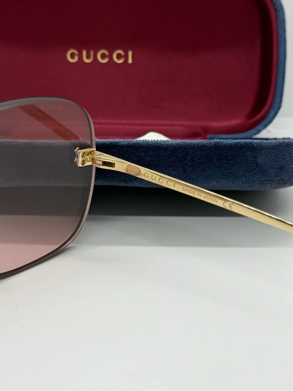 Gucci Gold-Trim Rimless Sunglasses with Rose Lenses